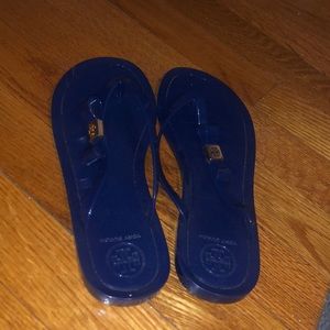 Tory Burch blue flat sandals.